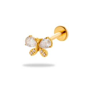 Golden G23 titanium butterfly lip stud with sparkling cubic zirconia on a white background