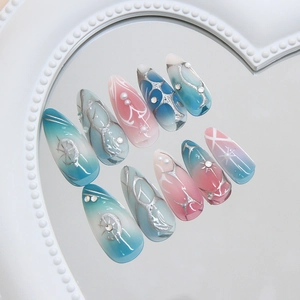 Starry sky gradient press-on nails with metallic lines and pearls on heart mirror