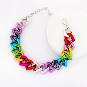 Close-up of rainbow gradient heart link pet necklace with adjustable chain and clasp