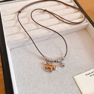 New Chinese wooden rocking horse necklace with brown leather cord and silver star charms