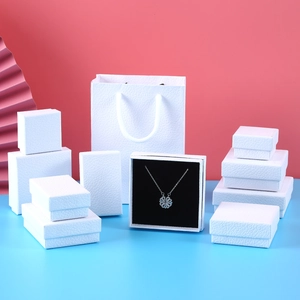 Elegant white litchi pattern jewelry gift box set with paper bags for rings and necklaces