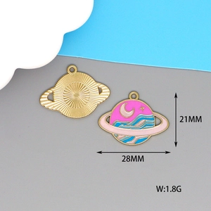 Detailed view of enamel asteroid pendant with moon and stars, size 28mm by 21mm