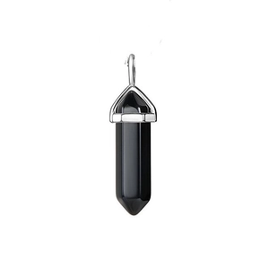 Detailed close-up of a hexagonal black obsidian crystal pendant with a polished silver clasp
