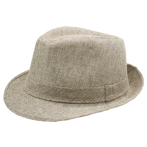Macro detail showing woven linen texture and curved brim of the vintage fedora hat
