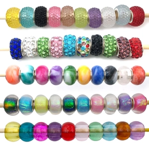 Macro shot of colorful large hole European style beads with various textures and finishes