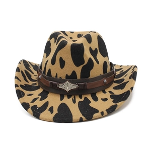 Thick felt western cowboy hat with cow print pattern and vintage engraved metal buckle