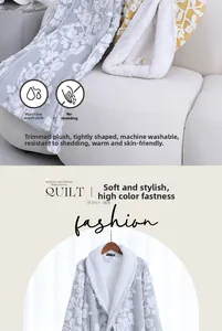 Detail view of thick grey jacquard fleece robe showing machine washable fabric texture