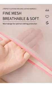 Gros plan du filet à linge à mailles fines avec fermeture éclair rose et protection