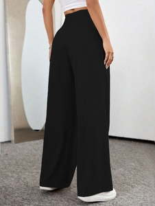 Classic high waist black wide leg trousers for women with a minimalist professional drape