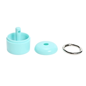 Three-piece assembly of a mint green jewelry storage container with silver metal ring