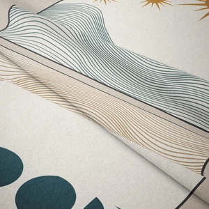 Close-up of Bohemian wall tapestry showing sun pattern and soft woven fabric texture