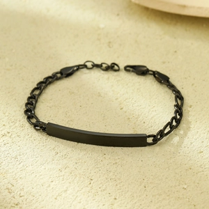 Close-up of black 18K vacuum plated titanium steel Cuban chain with blank bar tag