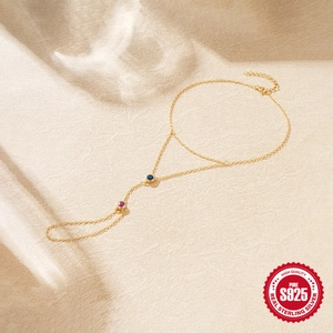 S925 sterling silver gold plated hand chain with blue and red crystal gems for women