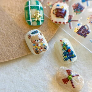 Christmas bear and tree embossed nail art stickers with classic red and green festive patterns
