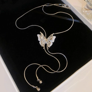 Elegant double-layered butterfly tassel necklace with adjustable silver snake chain