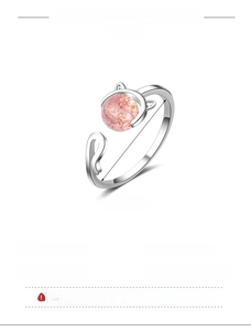 Macro shot of silver cat ear ring with pink gemstone and 1.7cm inner diameter detail