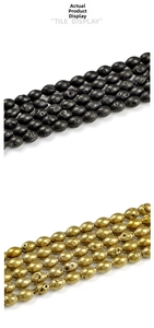 Detailed tile display of black and gold geode agate beads with vintage crater texture