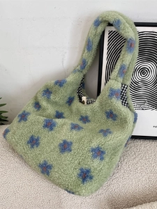 Green plush tote bag with blue flower patterns and soft lamb wool texture for winter
