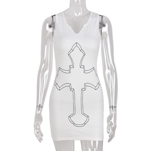 Detail view of white sleeveless knit mini dress with black cross print and U-neckline