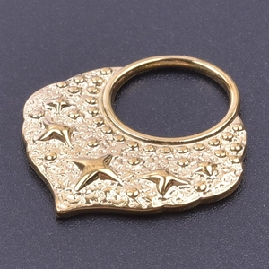 Detailed view of 18k gold plated stainless steel star relief pendant with dotted texture
