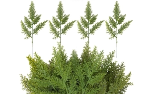 Detailed view of artificial green pine needles branches for DIY Christmas tree decor