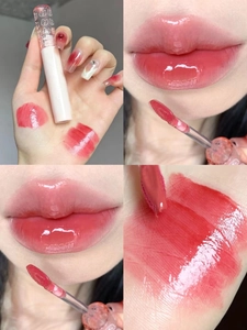 Detailed views of glossy pink lip glaze showing wand, hand swatch, and moisturizing lip finish