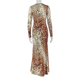 Detail of the bodycon leopard print maxi dress showing back view and slim fit silhouette