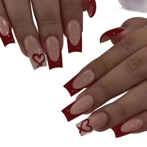 Long square french press on nails with red heart patterns and nude base