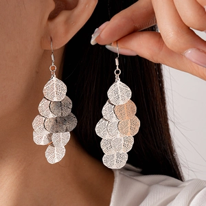 Irregular hollow leaf tassel drop earrings in silver finish with metal texture
