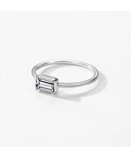 Side view of elegant S925 sterling silver ring featuring emerald cut solitaire cubic zirconia