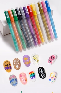 Set of 12 multi-color acrylic nail art paint markers shown with creative hand-drawn nail tips