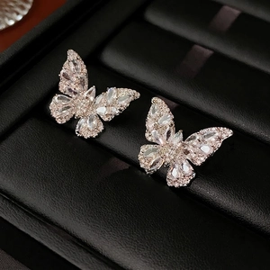 Sparkling silver butterfly stud earrings with zircon inlay on premium black leather