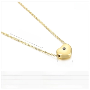 Detail showing dimensions of gold heart pendant with black rhinestone and chain length