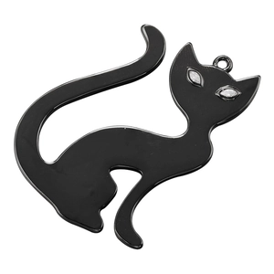Close-up of a glossy black metal cat pendant featuring sparkling gemstone eyes