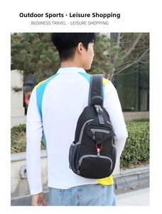 Rear view of a man wearing a black nylon multi-pocket outdoor bag with red elastic cords