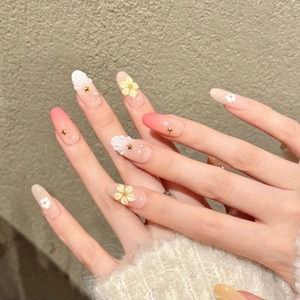 Handmade pink flower press-on nails with 3D floral designs and golden star accents