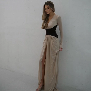 Elegant beige V-neck maxi dress with black waist contrast and high leg slit detail
