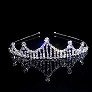 Detailed macro view of sparkling rhinestones and silver metal base on a bridal crown