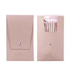 Pink PU leather makeup bag showing open and closed states with 7 gradient brushes