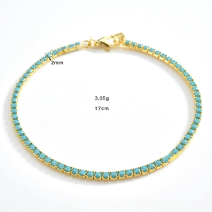 Detail of 17cm turquoise bead chain bracelet with gold finish and lobster clasp