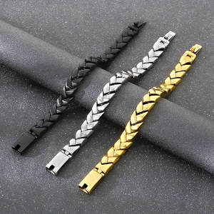 Detailed close-up of 11mm wheat chain bracelets in gold, silver, and black stainless steel