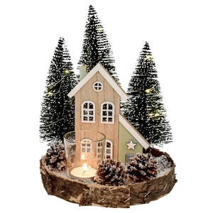 Lighted wooden Christmas house and tree centerpiece on rustic base with warm LED lights