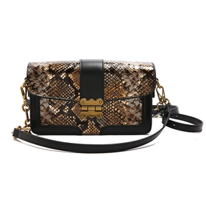 Retro snakeskin pattern handbag with gold clasp and adjustable black leather strap
