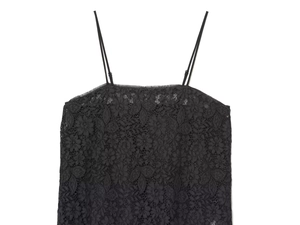 Detailed view of the intricate floral lace texture and thin straps of this black top
