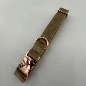 Detail of olive velvet dog collar with premium rose gold quick-release metal buckle