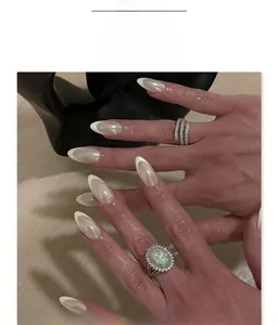 French white tip almond press-on nails with iridescent pearlescent finish and glossy coating