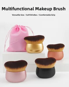Detailed view of multi-color body brushes with dense bristles and a pink suede storage bag