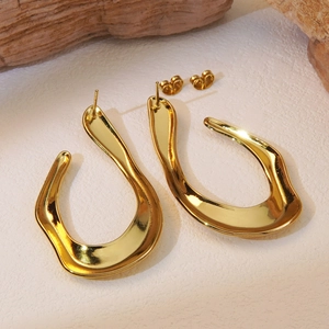 Minimalist gold irregular curved hoop earrings with high-polish mirror finish for women