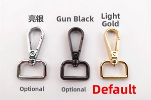 Close-up of adjustable metal lobster claw clasps in silver, gun black, and light gold