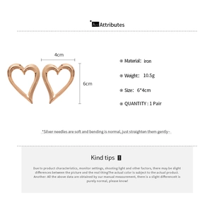 Detailed size specifications for rose gold heart earrings with silver needles